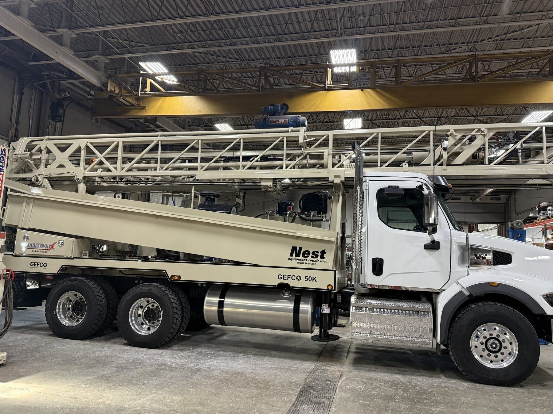 Nest Equipment shop with a GEFCO drilling rig truck