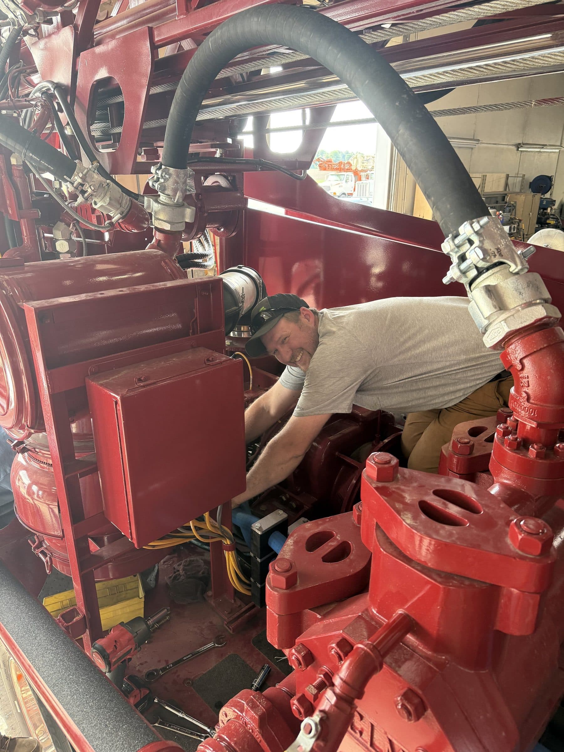 Mechanic repairing rig components